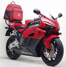Introducing the Ventura EVO-12 Bike-Pack Kit for Honda CBR 1000 RR4/RR5 Fireblade (04-05)! Includes a sleek black EVO-12 pack, versatile Evo-Rack for secure attachment, and an L-bracket with screws. Each component is labeled for easy identification.