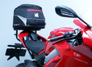 Image displaying Ducati 1100 Panigale V4 accessories by Ventura: at the top, a sleek black EVO-12 pack; on a bike, an Evo-Rack securely fastened; below, an L-Bracket set with screws. Accompanied by the text "Generic Image.