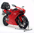 The Ventura EVO-12 Bike-Pack Kit for Ducati 1098 (07-08) includes a black EVO-12 bike pack, an Evo-Rack mounted on the motorcycle, and a labeled L-Bracket with screws, shown in a generic image on a white background.