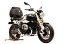 The Ventura EVO-12 Bike-Pack Kit for the BMW R nineT (15 - >) includes a stylish black pack with orange accents, mounted on the EVO-RACK. It features a versatile Top-Box Rack with L-brackets and screws, as shown in a generic image.