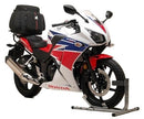 The Honda CBR 300R (15-18) EVO-12 Bike-Pack Kit by Ventura includes a black bike-pack with a red stripe, the versatile "EVO-RACK" Sport-Rack, and comes with a sturdy metal L-bracket and screws.