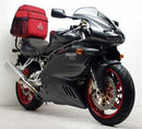 The image shows the Ventura EVO-12 Bike-Pack Kit for Ducati 1000 Supersport DS (03-06), featuring a black EVO-12 pack, metal Evo-Rack on a motorcycle, and L-bracket with screws. All components are labeled for clear identification.