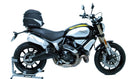 Image of the Ventura EVO-12 Bike-Pack Kit with a Ducati 1100 Scrambler (2018) showcasing a sleek black EVO-12 pack with an orange stripe, featuring the versatile Evo-Rack mounted on a bike frame and L-Bracket parts displayed separately.