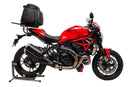The Ventura EVO-12 Bike-Pack Kit for the Ducati 1200R Monster (2016) features a black triangular pack, an Evo-Rack platform for secure transport, and an L-bracket with screws for easy mounting.