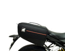 Image showcasing a Ventura EVO-12 Bike-Pack Kit containing three components: a black and gray EVO-12 pack with zipper, an Evo-Rack on a Honda CB 650R/CBR 650R (19-20) for stability, and L-brackets with screws, all in this generic image.