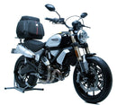 Image of the Ventura EVO-12 Bike-Pack Kit with a Ducati 1100 Scrambler (2018) showcasing a sleek black EVO-12 pack with an orange stripe, featuring the versatile Evo-Rack mounted on a bike frame and L-Bracket parts displayed separately.