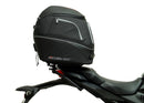 Image showcasing a Ventura EVO-12 Bike-Pack Kit containing three components: a black and gray EVO-12 pack with zipper, an Evo-Rack on a Honda CB 650R/CBR 650R (19-20) for stability, and L-brackets with screws, all in this generic image.