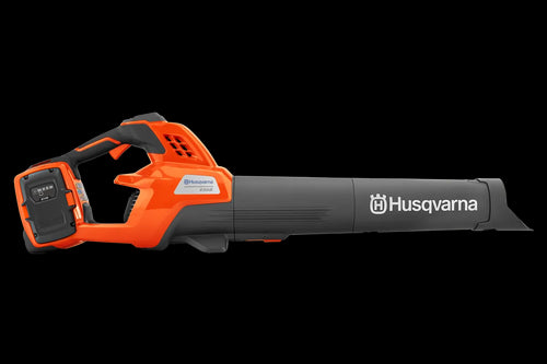 The Husqvarna 230iB Leaf Blower skin, featuring a brushless motor for enhanced efficiency, showcases a sleek orange design with black and gray accents. The "Husqvarna" name is proudly displayed on the tube, and its ergonomic handle ensures comfortable operation.