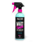 A spray bottle of Muc-Off Matt Finish Detailer - NEW! from MUC OFF, labeled "The Ultimate Matt Finish Detailer," provides a protective finish for satin matt paints. The 750 ml (25.4 fl oz) bottle showcases a sleek design with black and pink accents, including text and a pink nozzle.