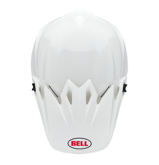 The Bell MX-9 MIPS White full-face helmet features a polycarbonate shell, visor peak, and the Velocity Flow ventilation system for comfort. The BELL logo in red and black adorns the side.