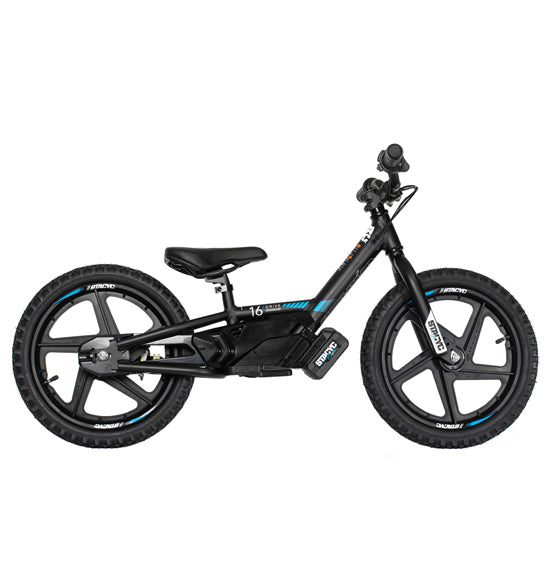 The STACYC 16eDRIVE Brushless - Electric Balance Bike by STACYC is a black model equipped with 16” composite wheels and a high-output brushless motor. It features large tires, a low seat, and adjustable handlebars, highlighted in blue and white with brand markings on the frame. Its compact, minimalist design incorporates a lithium-ion battery.
