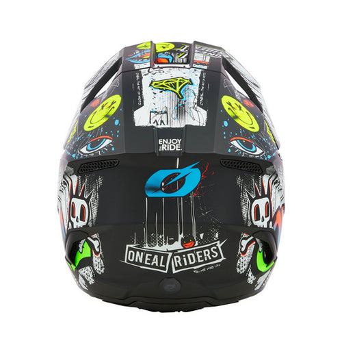The O'Neal 2025 Youth 3SRS RANCID Helmet - Multi is a black motocross helmet adorned with vivid graffiti-style artwork. The intricate design showcases colorful letters spelling "ONEAL," various doodles, a crown, and multiple expressive faces and symbols. Featuring a Polycarbonate/ABS Shell, the helmet also includes a visor, chin guard for protection, and a washable padded liner for added comfort.