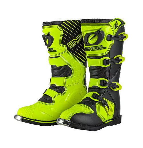 O'Neal Youth RIDER Boots in neon yellow and black, designed with a rugged look and secure buckles. These boots feature injection-molded plastic protective plates and metal shank reinforcements, with the Oneal logo displayed prominently on the upper section. Textured patterns enhance both grip and style.