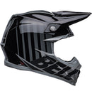 Introducing the Bell MOTO-9S FLEX Sprint Matte/Gloss Black/Grey: a sleek off-road racing helmet with silver accents and an aggressive design. This safety-focused helmet features a visor, angular lines, and prominently displays the BELL brand on the side. It is ideal for off-road and motocross activities.