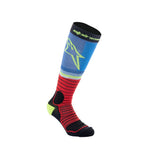 Introducing MX Pro Socks by Crown Kiwi Enterprises Limited, showcasing a vibrant knee-high design with a striking blue top and green star logo. These moisture-wicking socks transition to a red hue embellished with black and green accents, horizontal stripes, and distinctive contrasting heel and toe sections—perfect for off-road adventures.