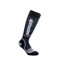 The Alpinestars Youth MX Plus Socks, from Crown Kiwi Enterprises Limited, are single black and gray knee-high sports socks featuring white lettering along the side. They have a textured foot area for added comfort and moisture-wicking properties, making them perfect for wearing with off-road boots and ensuring optimal performance.
