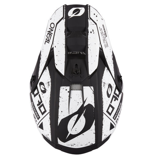 Top view of the black and white O'Neal 2024 5SRS SCARZ Helmet from ONEAL. This off-road motorcycle helmet boasts a bold design with stylized graphics, featuring the prominent O'Neal logo. It has an aerodynamic shape with air vents and is constructed from durable ABS material that meets ECE 22-06 safety standards.