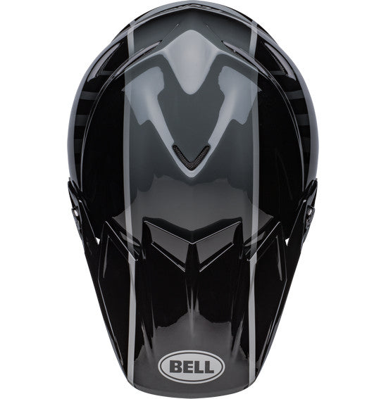 Introducing the Bell MOTO-9S FLEX Sprint Matte/Gloss Black/Grey: a sleek off-road racing helmet with silver accents and an aggressive design. This safety-focused helmet features a visor, angular lines, and prominently displays the BELL brand on the side. It is ideal for off-road and motocross activities.