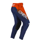 The O'Neal 2025 MAYHEM Hexx Pant - Blue/Orange features reinforced knee areas and a belt. The word "ONEAL" is prominently printed in large white letters along the side. As a part of the Mayhem line, these motocross pants are crafted with durable denier fabrics and multiple panels, ensuring added durability, flexibility, and a lightweight design.