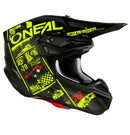 A top view of the O'Neal 5SRS ATTACK Helmet - Black/Neon showcases its striking graphic designs in neon yellow and white. The ABS shell construction ensures durability, with the ONEAL logo prominently displayed on the sides and top. Various branding and text, including a bold skull graphic, are imprinted around its surface.