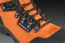 A pair of sturdy, orange and black Husqvarna Protective Leather Boots Technical Light. The boots feature thick rubber soles with deep treads for good traction, metal eyelets, black laces, and reinforced toe caps. One boot stands upright while the other is tilted on its side, reminiscent of rugged motorbike parts.