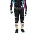 FOX 180 HELLO FUTURE PANTS by FOX feature black fabric with white, blue, and pink accents, bold logos, graphic designs on the thighs and waistband, plus reinforced knees. These motocross pants are shown on a white background.