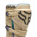 The FOX 180 HELLO FUTURE BOOTS from FOX feature beige, black, and pastel accents, a high-top design with multiple buckles, bold branding, a purple logo, and "HELLO FUTURE" on the strap—rugged durability meets future style.