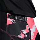The FOX 180 DIGI IMAGE PANTS feature a pink, black, and white geometric camo design, black knee panels, and a FOX logo on the thigh—built for dirt bike riders seeking comfort and mobility in the Rider Attack Position. Displayed on a white background.