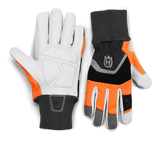 The Husqvarna Functional Gloves with saw protection, by Husqvarna, combine gray, white, black, and orange coloring. The left glove is displayed palm-up while the right glove is displayed palm-down. Both gloves feature a prominent gray logo on the wrist area and have ribbed cuffs for a secure fit.