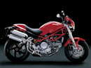 The Ventura EVO-12 Bike-Pack Kit for Ducati 800 Monster S2R (05-07) includes a black bike pack, an EVO-Rack mounted on the motorcycle, and L-brackets with screws, depicted in a generic image.