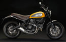 Image showing the Ventura EVO-12 Bike-Pack Kit for Ducati 800 Scrambler Classic (2015): a black EVO-12 pack, Evo-Rack Top-Box Rack on a motorcycle, and a black L-bracket with screws. Each item is labeled.