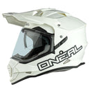 The front view of the O'Neal SIERRA Helmet R V.23 in Flat White showcases its angular design and geometric patterns. Designed by ONEAL, this stylish helmet is perfect for adventure bikes, featuring an integrated face shield, a small visor, and prominent branding—ideal for both safety and style.