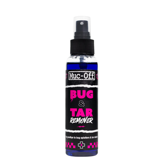 The Muc-Off Bug and Tar Remover by MUC OFF features a black, pink, and white label with bold text detailing its effortless removal of bug splatters, road grime, and tar stains. The spray bottle is equipped with a black cap and a clear top.