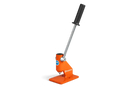 An image of an orange Husqvarna Chain breaker standing upright. It has a black handle at the end of the long lever arm and a base for stability. Constructed from welded steel, this robust tool with its circular orange mechanism is perfect for workshop use.