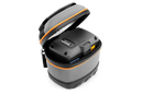 A compact, gray, cylindrical Husqvarna Battery Bag with a black base, black zippers, and orange trim. Perfect for storing essential motorbike accessories or small MX gear. It features two zipper pulls and a black loop handle on top. The brand name "Husqvarna" is embroidered on the top of the case.
