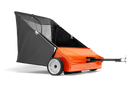 The Husqvarna Sweeper, by Husqvarna, includes a high-capacity collection system featuring a large black mesh hopper attached to an orange main body with white wheels. It is equipped with a front tow hitch for vehicle attachment and designed for efficiency with adjustable brush height to ensure optimal lawn debris collection.
