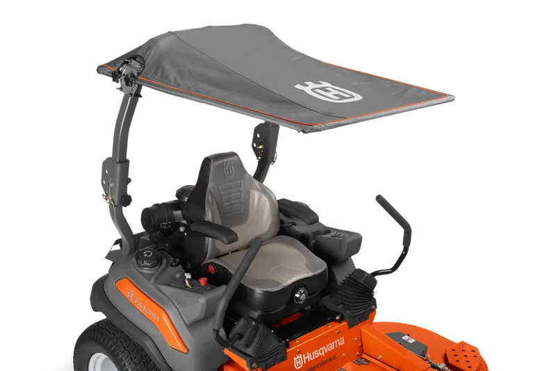 This Husqvarna Zero Turn lawn mower showcases an orange base, a black seat with steering controls, and a grey sun canopy supported by metal brackets above the seat. Both the body and the canopy prominently display the "Husqvarna" brand.