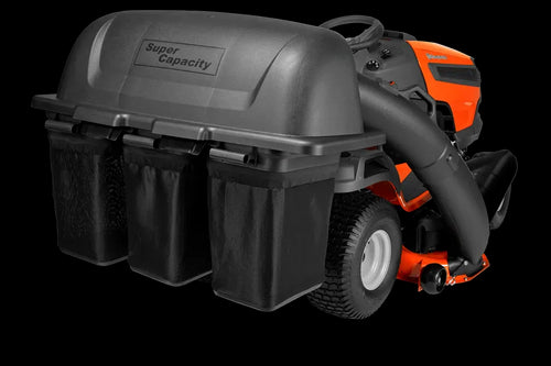 A close-up view of a Husqvarna TS Series Lawn Tractor equipped with a 48" 3 Bin Collector labeled "Super Capacity." The attachment includes three black bags for grass clippings. The orange mower, featuring a Clear Cut™ Deck, is accented in black and fitted with large, rugged tires.