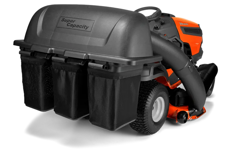 A close-up view of a Husqvarna TS Series Lawn Tractor equipped with a 48" 3 Bin Collector labeled "Super Capacity." The attachment includes three black bags for grass clippings. The orange mower, featuring a Clear Cut™ Deck, is accented in black and fitted with large, rugged tires.