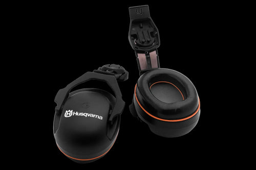 A pair of black Husqvarna H200 and Alveo hearing protectors for helmet mounts, featuring an orange accent. One earmuff is displayed upright showcasing the Husqvarna logo, while the other, equipped with a unique polyurethane insert, is laid horizontally revealing its soft cushioning interior. These lightweight over-ear protectors are designed to provide optimal hearing protection.