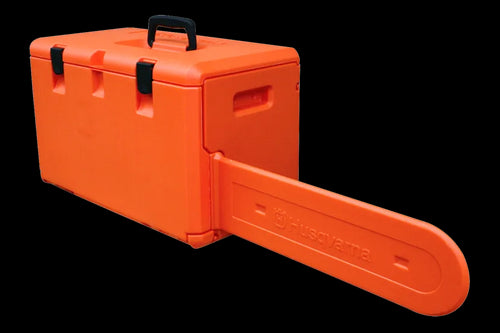 The Husqvarna Chainsaw Carry Case is an orange case with a handle on top and three black latches. It accommodates the chainsaw's guide bar, which extends out from the right side of the closed case, boasting the Husqvarna logo. This stackable design is compatible with the 572XP model.