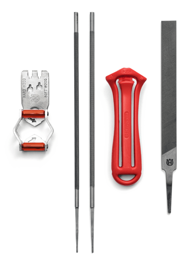 The packaging for the Husqvarna Filing Kits includes two round files, a flat file, a depth gauge tool, and a red/orange file handle. The background features a blue paper insert with text in multiple languages and the Husqvarna logo at the bottom, ensuring your chains remain perfectly sharpened.