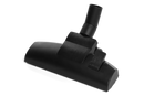 The Husqvarna Floor Nozzle by Husqvarna is a black, rectangular vacuum cleaner attachment with a circular pipe connector at the top for attaching to the vacuum cleaner hose. Ideal for vacuuming floors, it includes a brush adjustment switch. The product is shown against a white background.