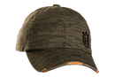 The Husqvarna Xplorer Cap bark camo is a vintage dark green cap with a worn, faded appearance and slight distressing on the brim. It features an embroidered black emblem on the front, a curved bill, forest green bark camo pattern, and an adjustable leather band, shown against a white background.