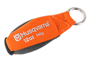 An orange and black Husqvarna Throw Weight, branded with "Husqvarna 12 oz 340g" in white text, features a metal ring at one end for easy attachment. Its exterior is crafted from durable Cordura fabric, ensuring high tensile strength.