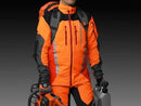 The Husqvarna Xplorer Duffel Bag 70L is an orange, sturdy tarpaulin bag featuring black handles, straps, and zippers. It showcases the Husqvarna logo in black on the front. Designed for convenience, it includes two top handles and an adjustable, removable shoulder strap.