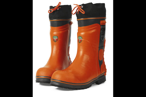 A pair of bright orange Husqvarna Protective boots - Functional 24 with black accents around the top edges and soles. The boots have a lace-up feature and reflective patches near the top. There's a Husqvarna logo on the side along with some certification marks, making them essential accessories for any rider. The soles appear thick and sturdy.