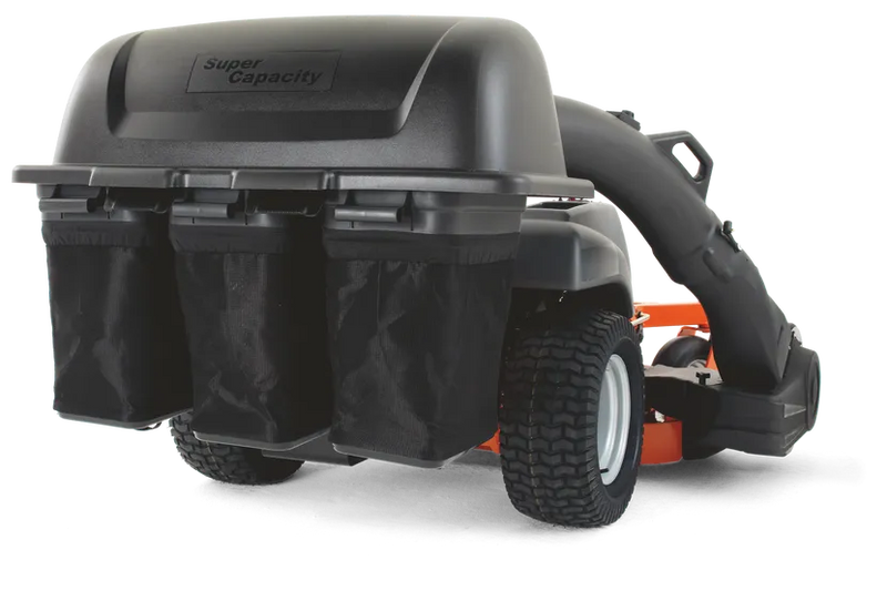 A Husqvarna ZTR® Zero Turn mower equipped with a black "Super Capacity" Triple Bin Collection System featuring a blower. The system includes three separate nylon bags for collecting grass clippings, and the mower has sturdy, large treaded tires.