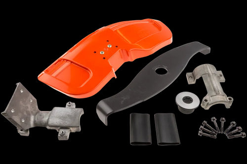 A collection of industrial metal parts, including orange and black components, small metal brackets, and various metallic pieces organized on a white background. This assortment features the Husqvarna Shredder Blade Kit from Husqvarna, with the components varying in size and shape. Some parts appear to be covers or protective elements for brushcutters.