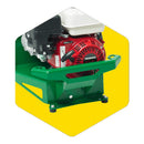 Close-up of a green and red Hansa Replacement Bumper mounted on a green frame, set against a bright yellow hexagonal background. The Hansa, often used in generators for gardens or lawns, features a pull start mechanism and a white top cover.